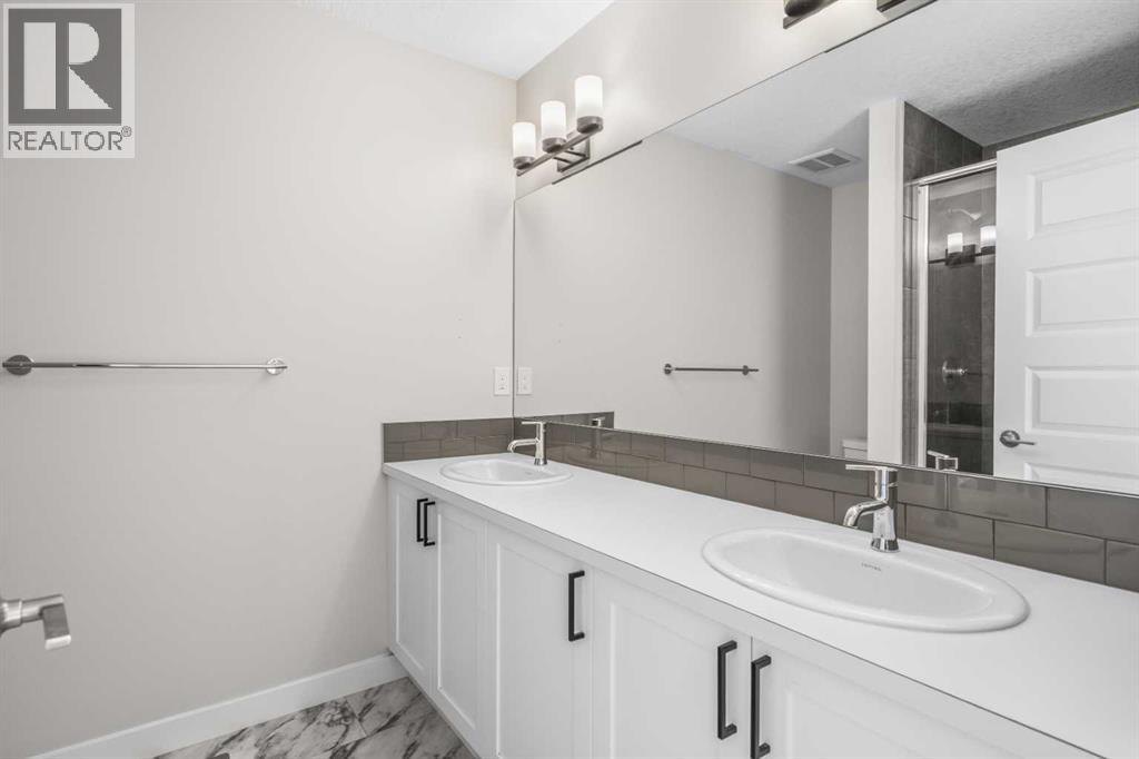 Photo 12 of 1117 Bayview Gardens Sw, Airdrie AB