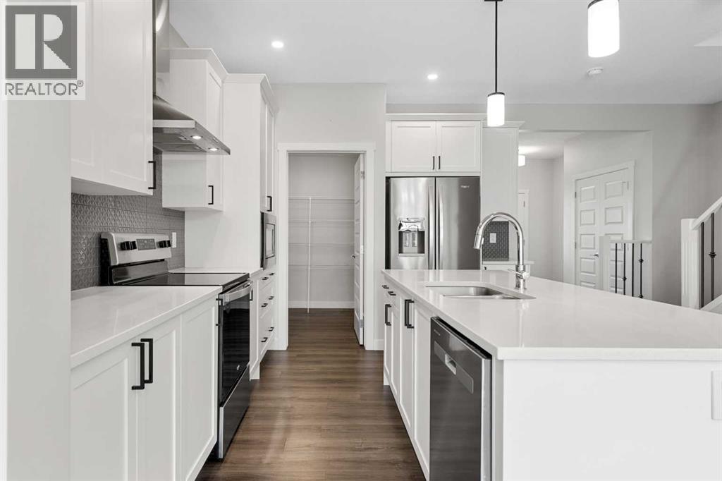 Photo 9 of 1117 Bayview Gardens Sw, Airdrie AB