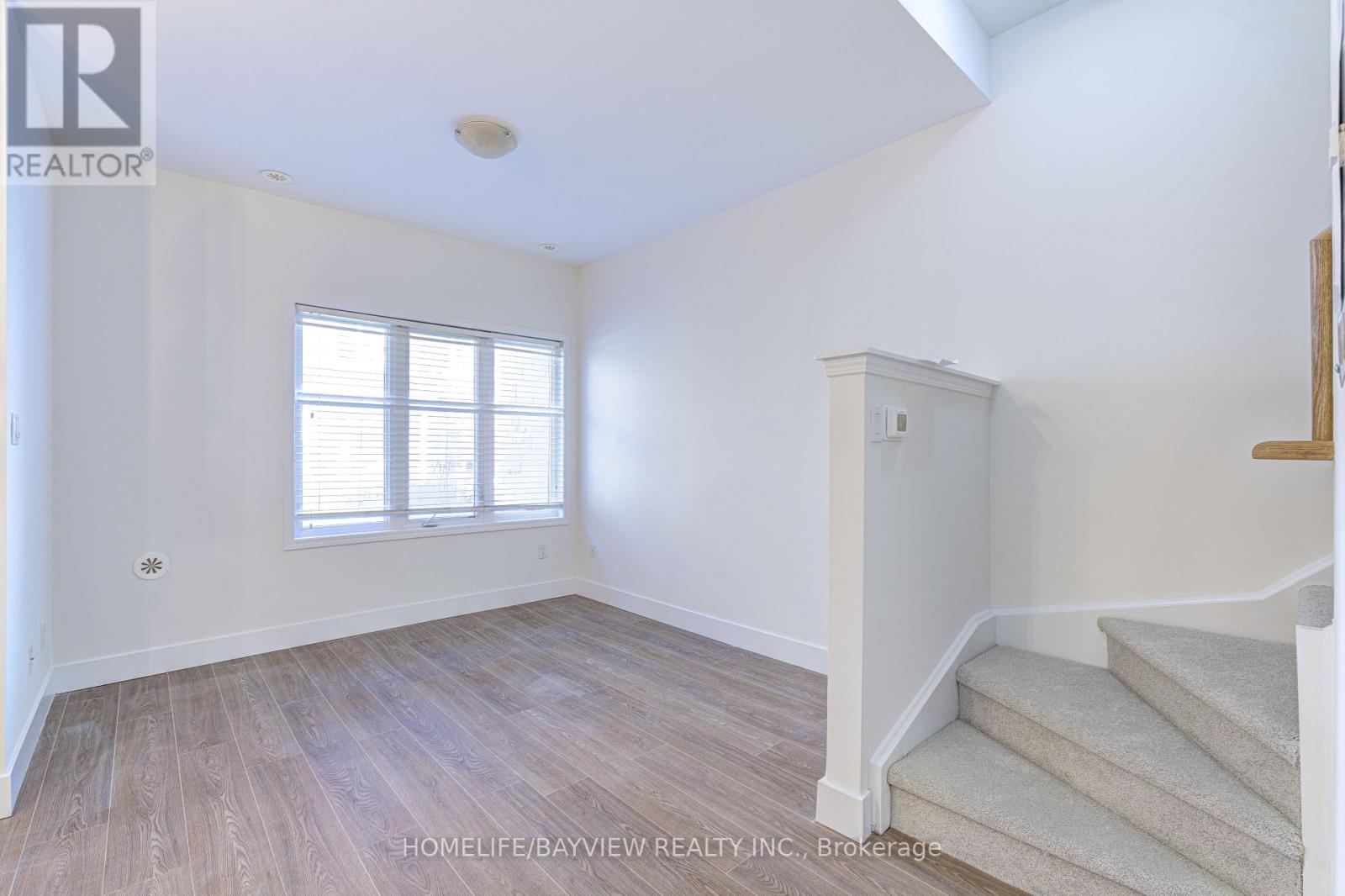 Photo 15 of Th 12 25 Coneflower Crescent, Toronto ON