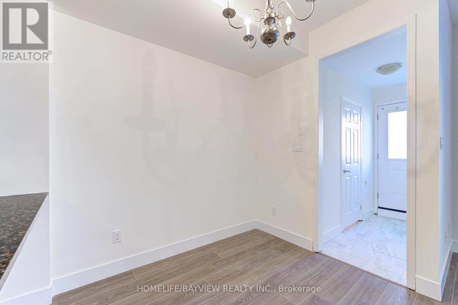Photo 3 of Th 12 25 Coneflower Crescent, Toronto ON