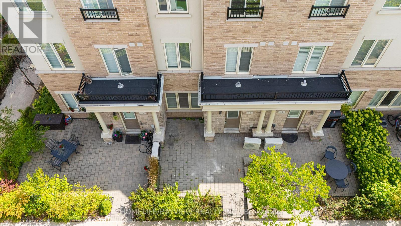 Photo 5 of Th 12 25 Coneflower Crescent, Toronto ON