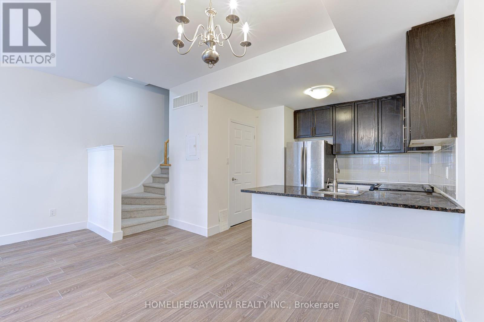Photo 21 of Th 12 25 Coneflower Crescent, Toronto ON