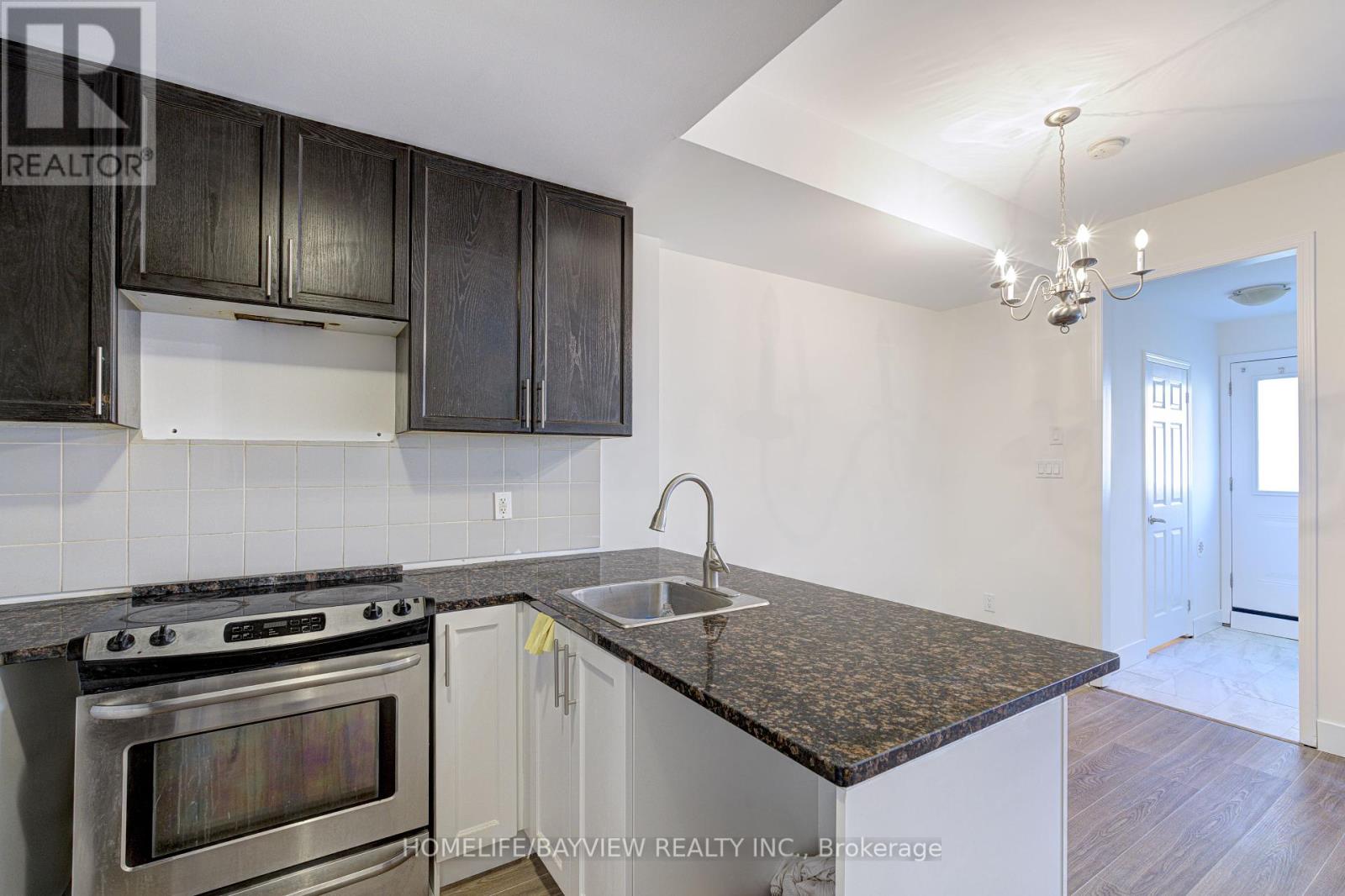 Photo 17 of Th 12 25 Coneflower Crescent, Toronto ON