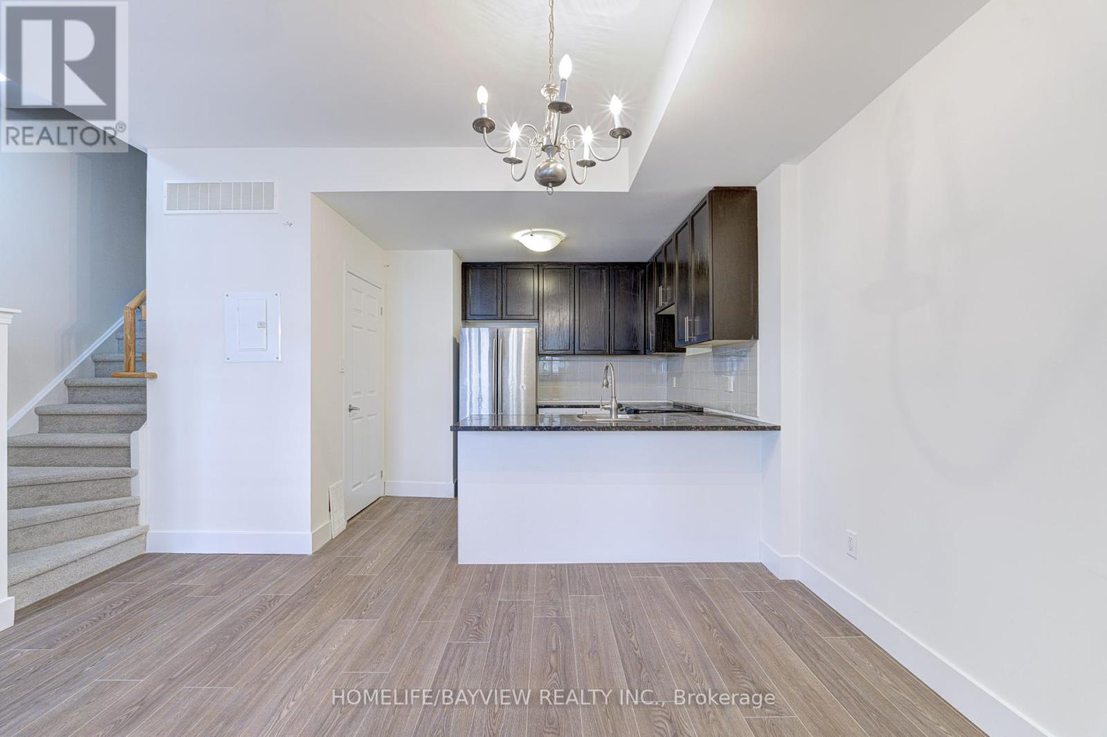 Photo 26 of Th 12 25 Coneflower Crescent, Toronto ON