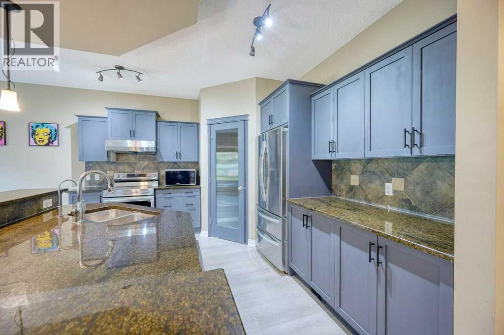 Photo 5 of 34 Aspen Stone Mews Sw, Calgary AB