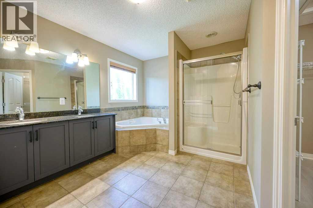 Photo 20 of 34 Aspen Stone Mews Sw, Calgary AB