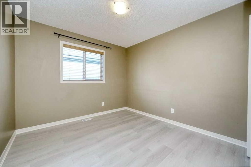 Photo 22 of 34 Aspen Stone Mews Sw, Calgary AB