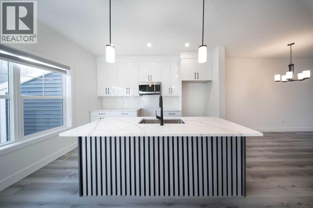 Photo 4 of 51 Baysprings Terrace Sw, Airdrie AB