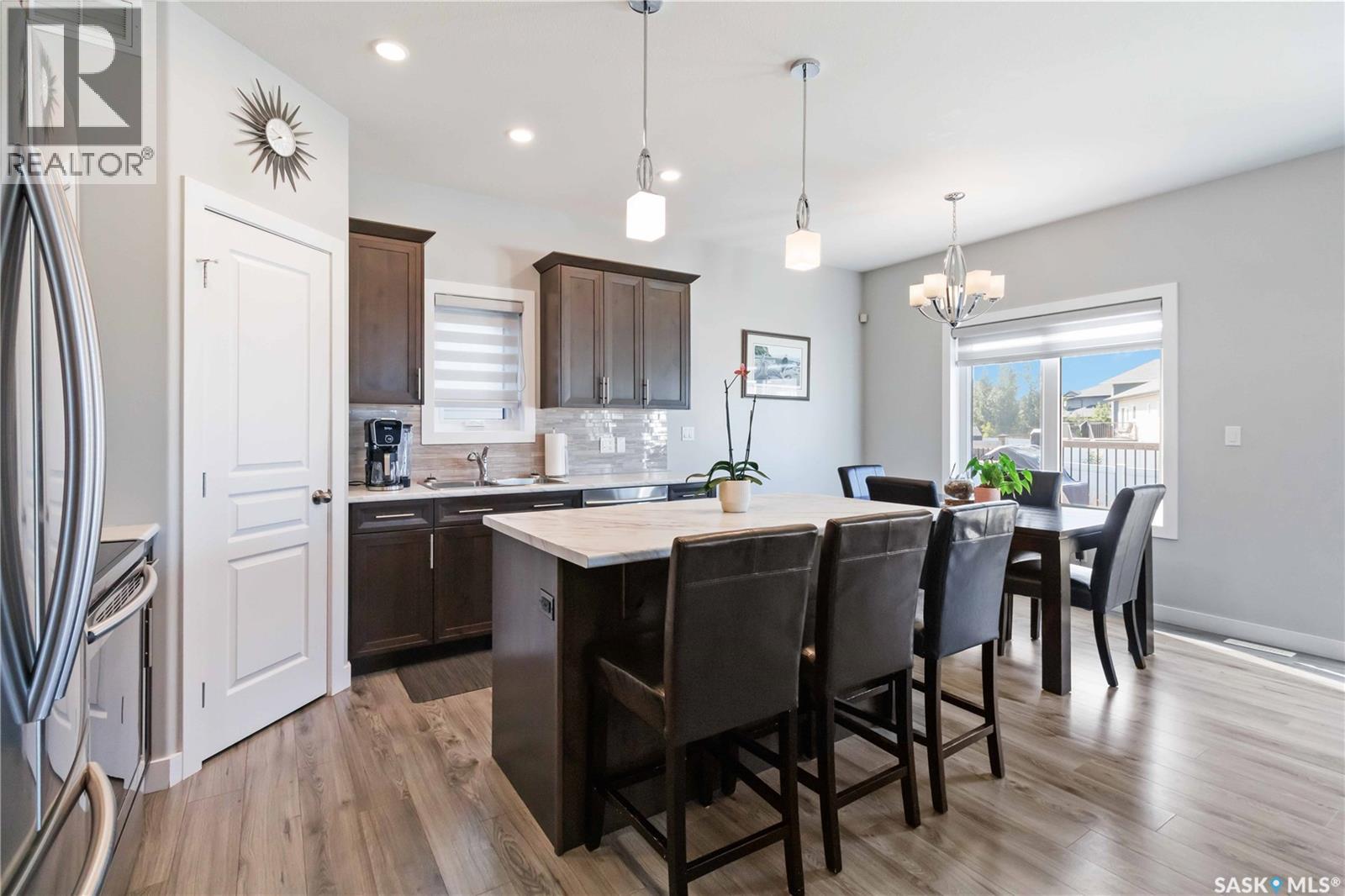 Single Family House 2 Level for Sale in  Glacial Shores MANOR Saskatoon 