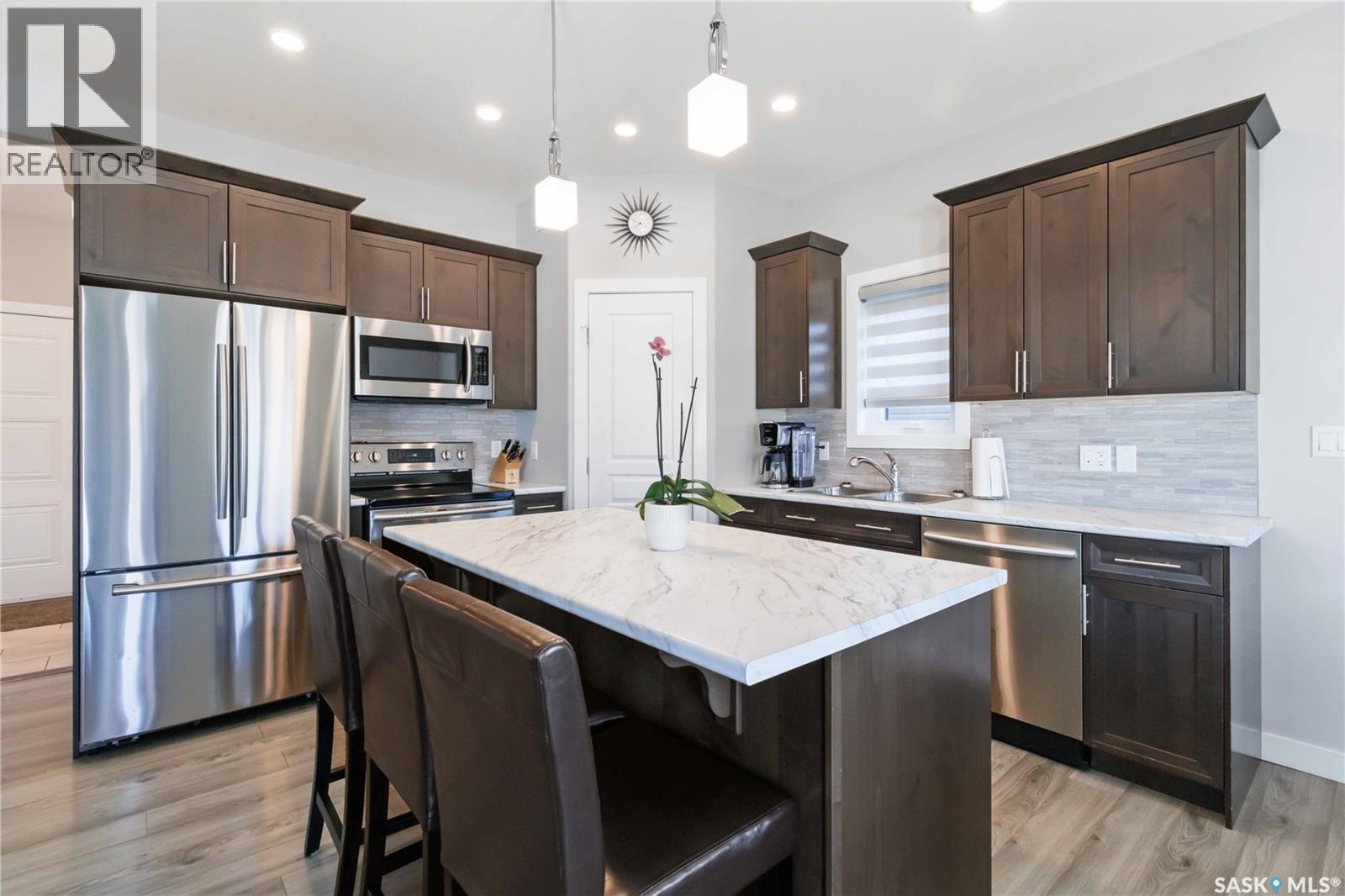 Single Family House 2 Level for Sale in  Glacial Shores MANOR Saskatoon 