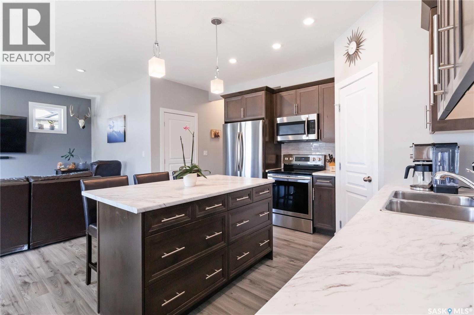 Single Family House 2 Level for Sale in  Glacial Shores MANOR Saskatoon 