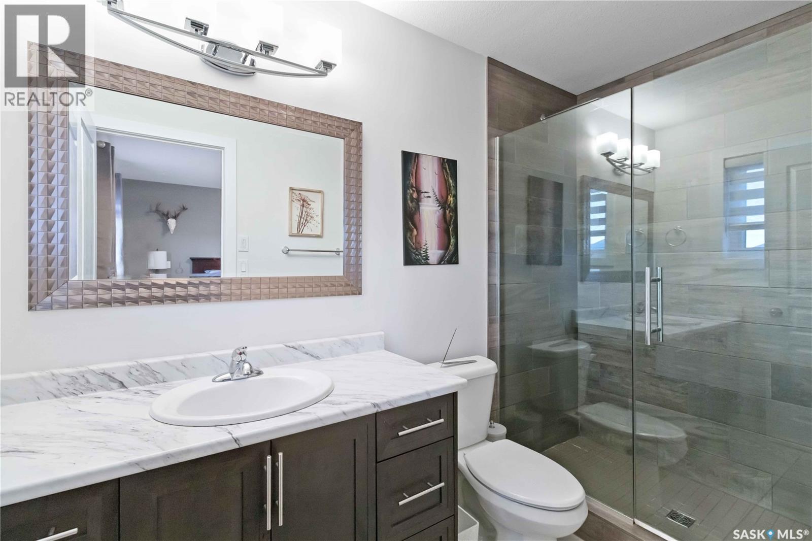 Single Family House 2 Level for Sale in  Glacial Shores MANOR Saskatoon 