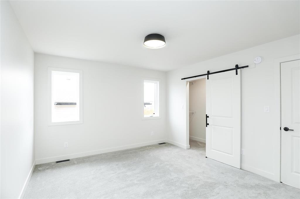 Photo 11 of 203 Wyndham Estate Drive, Steinbach MB