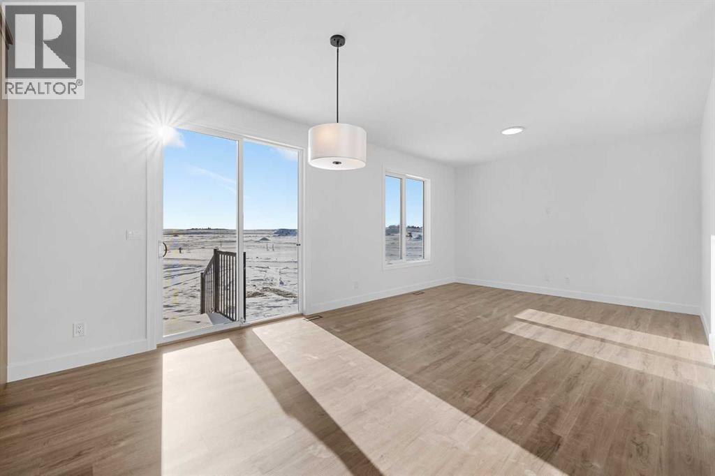 Photo 5 of 1059 Southwinds Green Sw, Airdrie AB