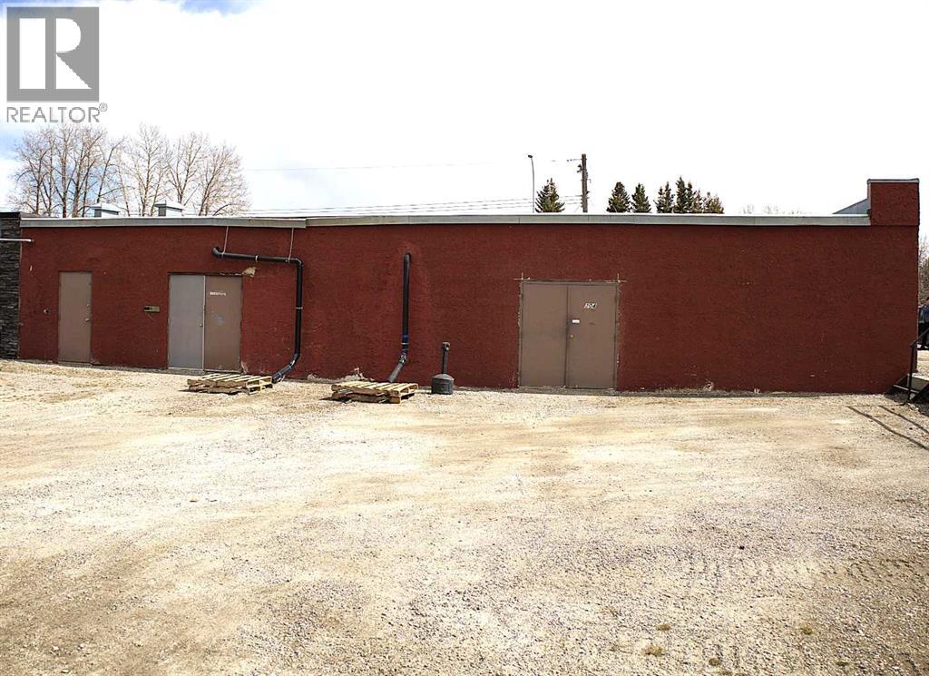 Photo 5 of 1 2 Combined 204 Centre Street N, Sundre AB