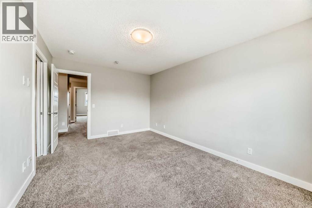 Photo 13 of 221 Midgrove Mews Sw, Airdrie AB