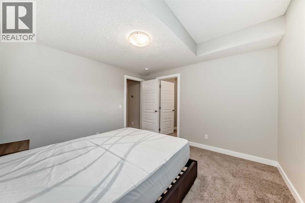 Photo 34 of 221 Midgrove Mews Sw, Airdrie AB