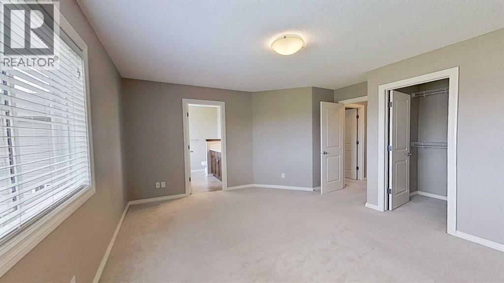 Photo 6 of 161 Silverado Range Cove Sw, Calgary AB