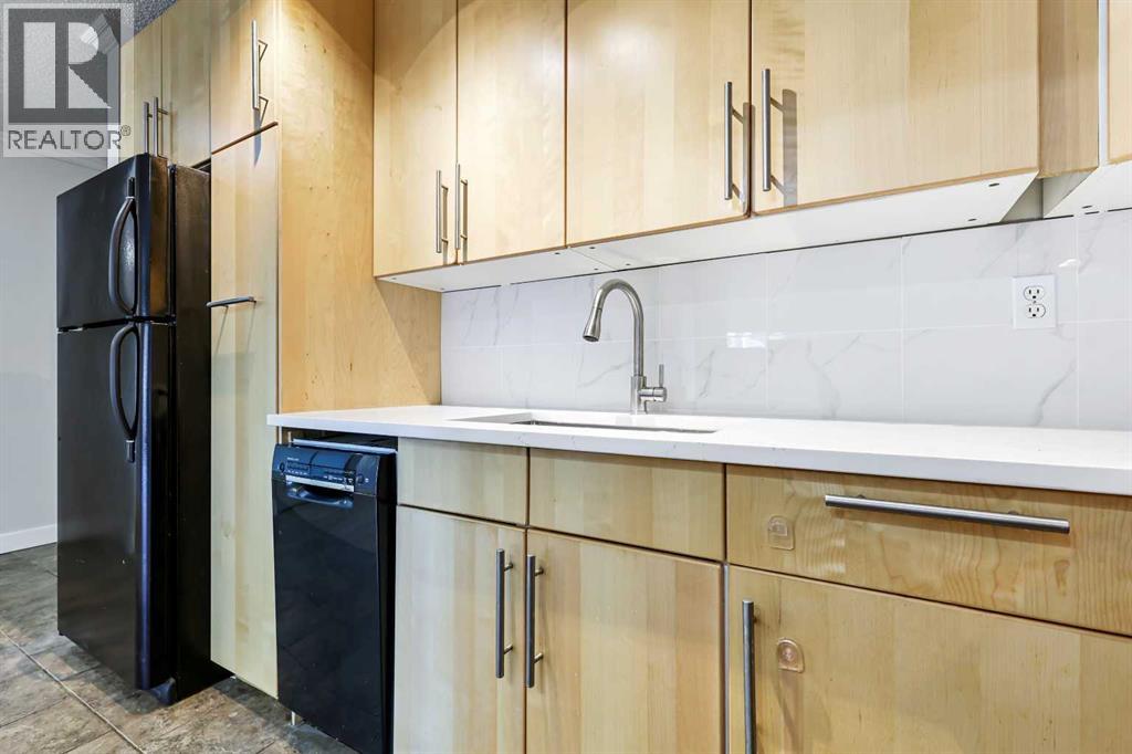 Photo 10 of 305 732 57 Avenue Sw, Calgary AB