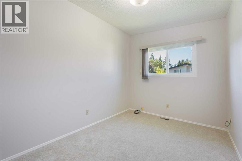 Photo 17 of 11741 Canfield Road Sw, Calgary AB