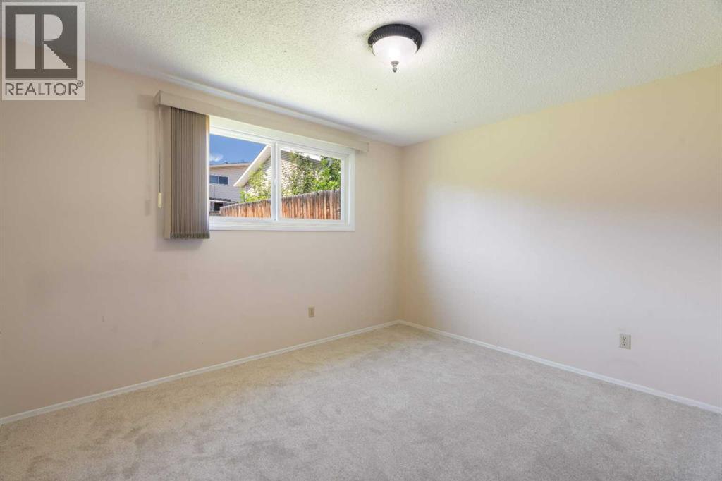 Photo 21 of 11741 Canfield Road Sw, Calgary AB