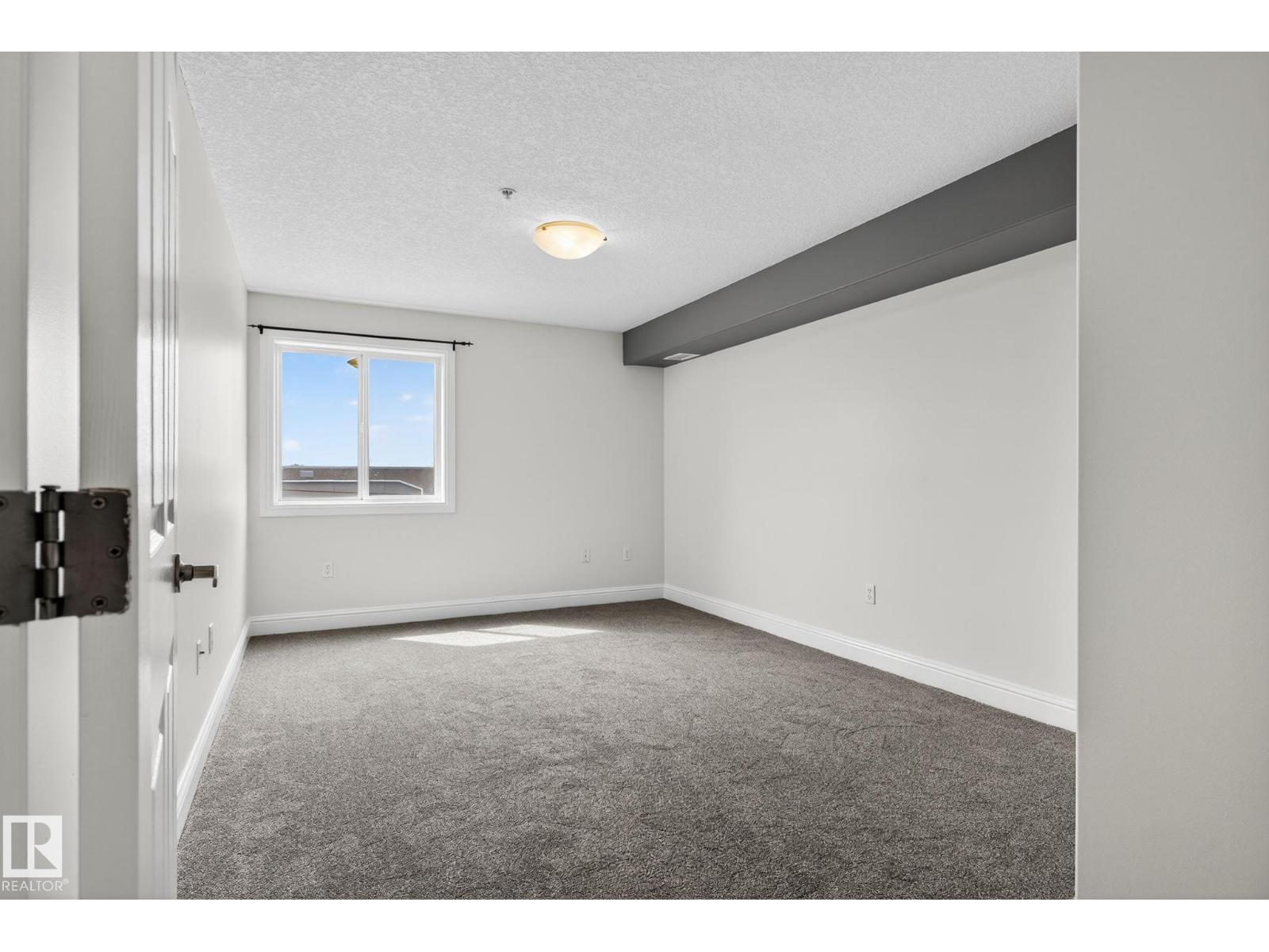 Photo 9 of 310 13111 140 Av Nw, Edmonton AB