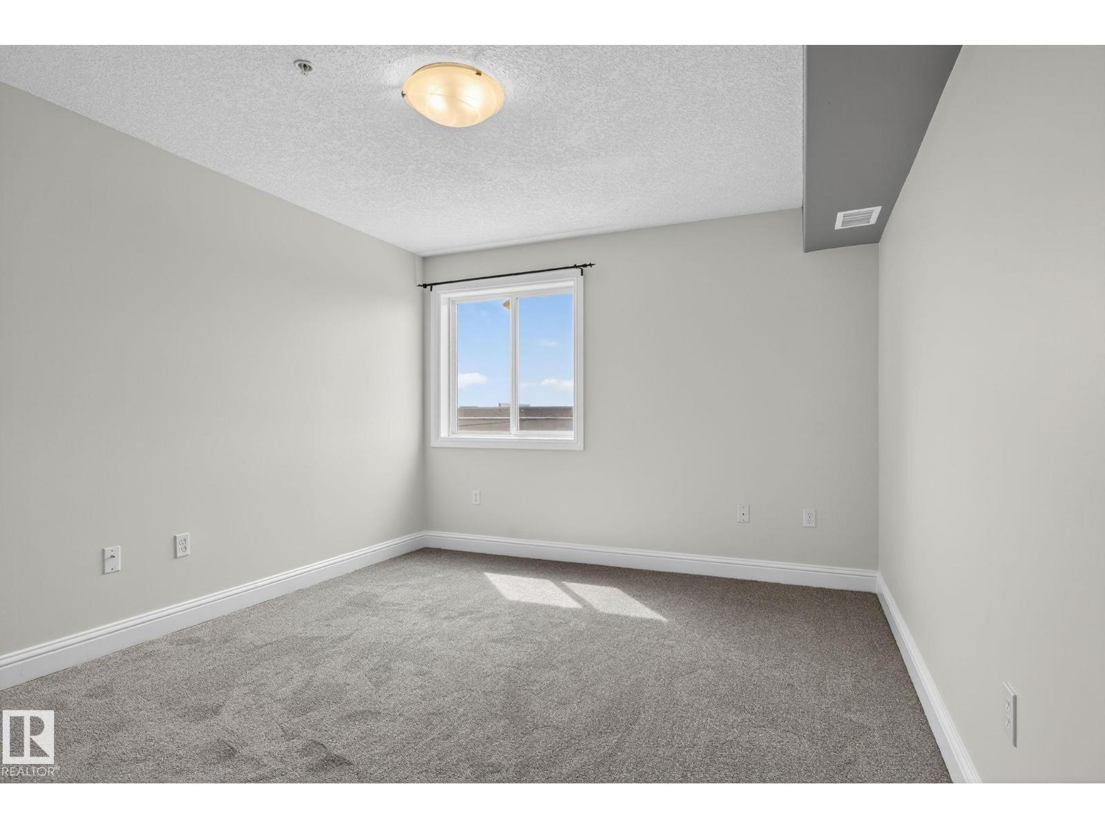 Photo 28 of 310 13111 140 Av Nw, Edmonton AB
