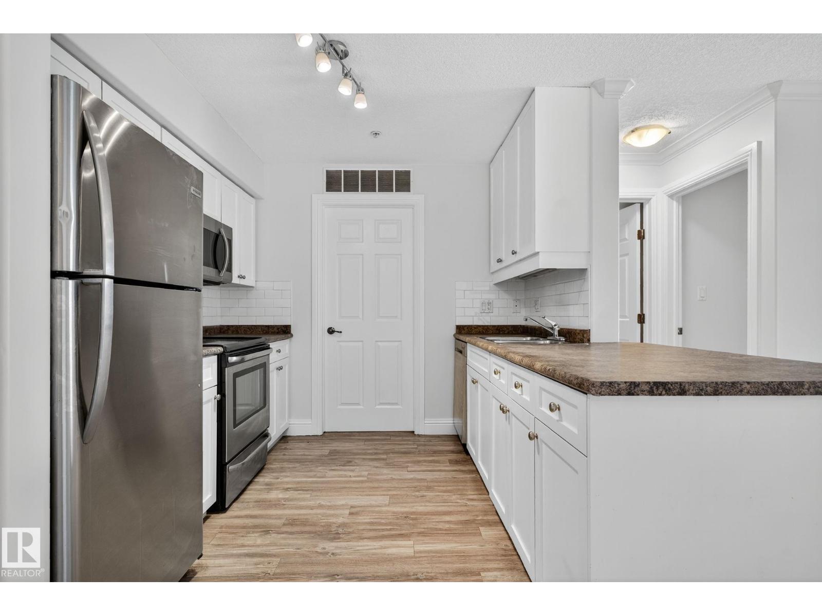 Photo 8 of 310 13111 140 Av Nw, Edmonton AB