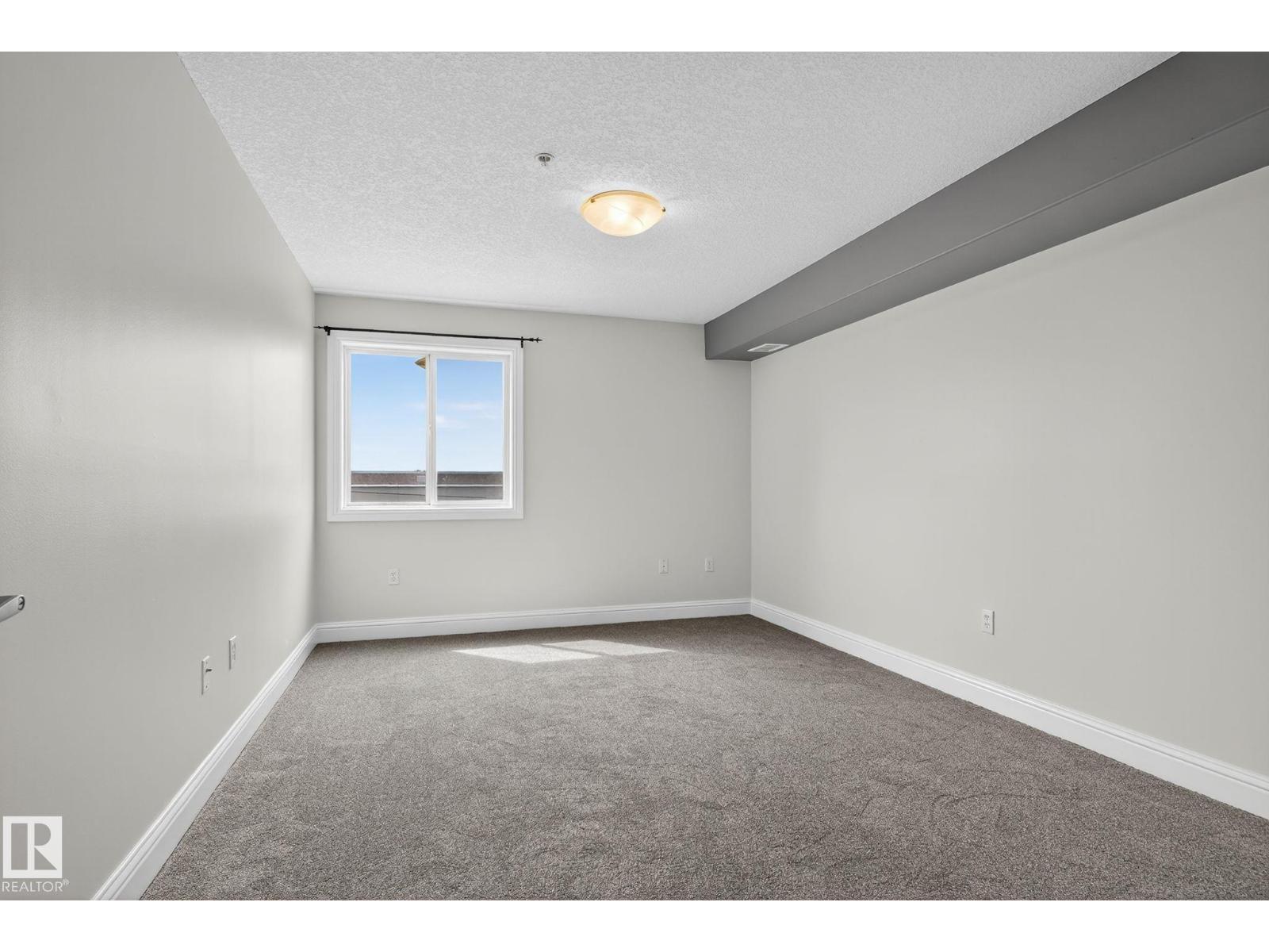 Photo 19 of 310 13111 140 Av Nw, Edmonton AB