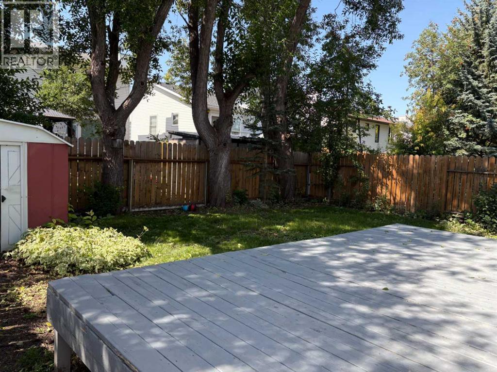 Photo 6 of 256 Woodstock Place Sw, Calgary AB
