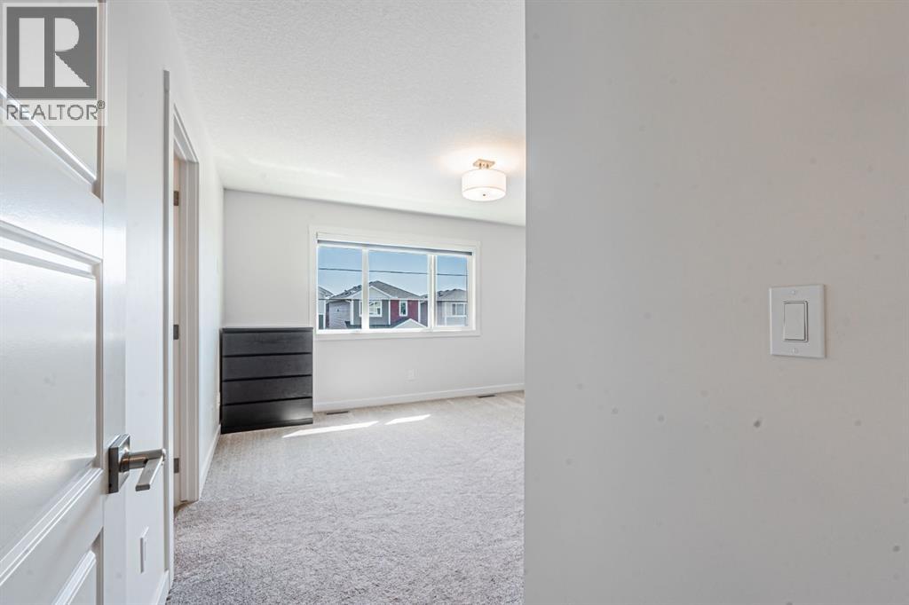 Photo 11 of 609 Baywater Manor Sw, Airdrie AB
