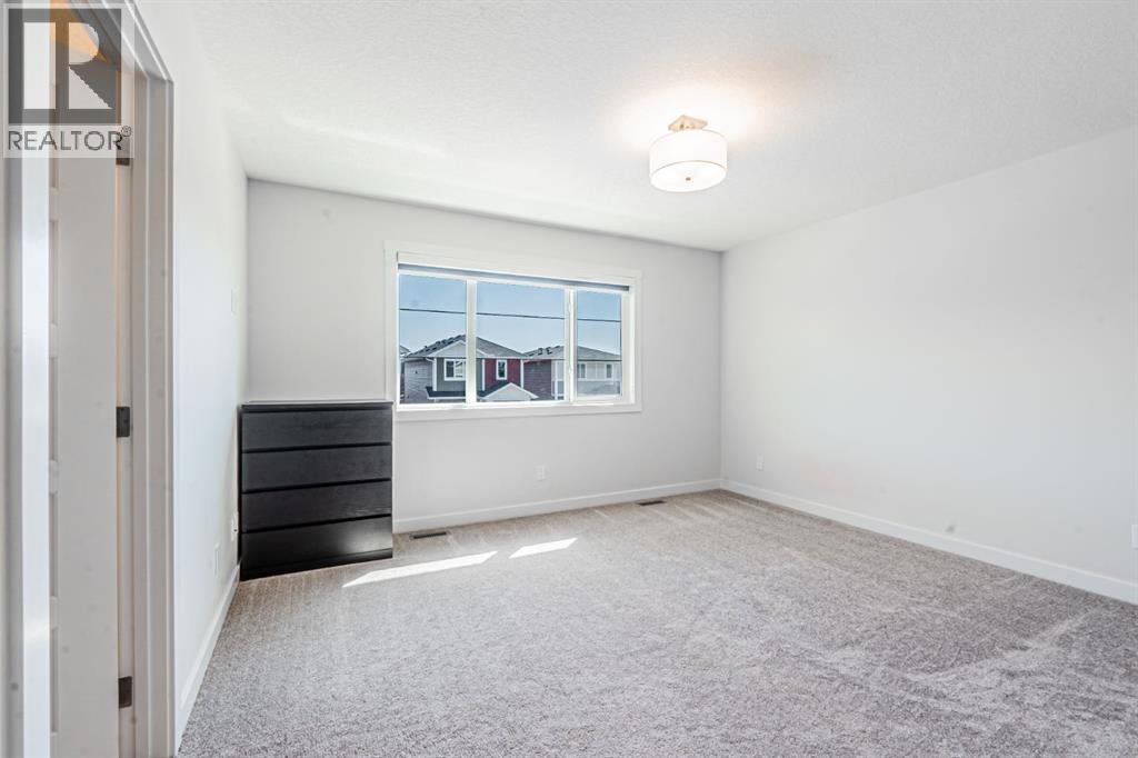 Photo 26 of 609 Baywater Manor Sw, Airdrie AB