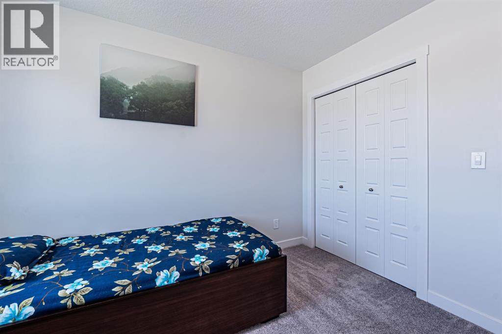 Photo 13 of 609 Baywater Manor Sw, Airdrie AB