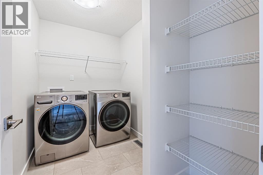 Photo 47 of 609 Baywater Manor Sw, Airdrie AB