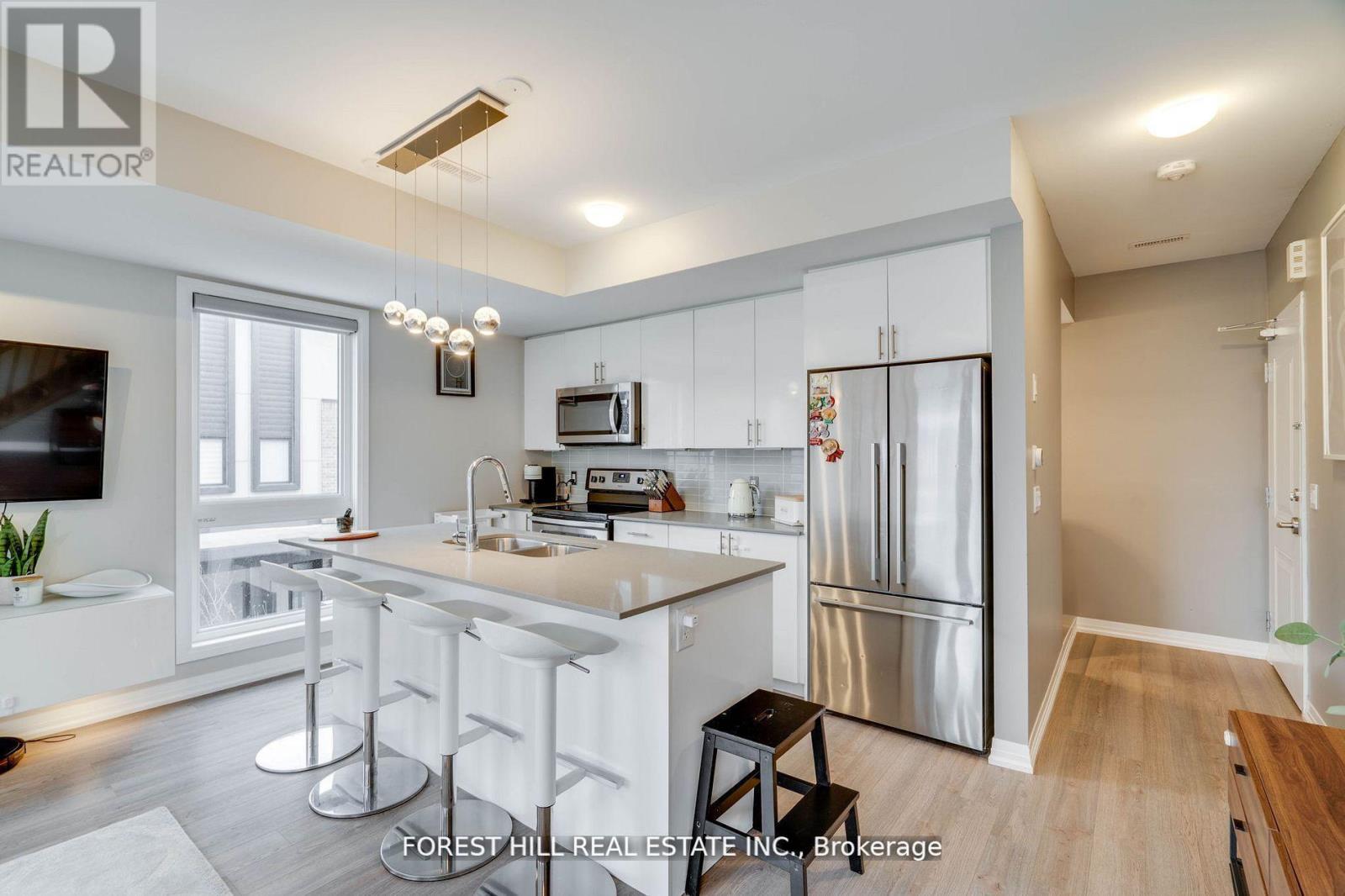Photo 5 of 208 1210 Main Street E, Milton ON