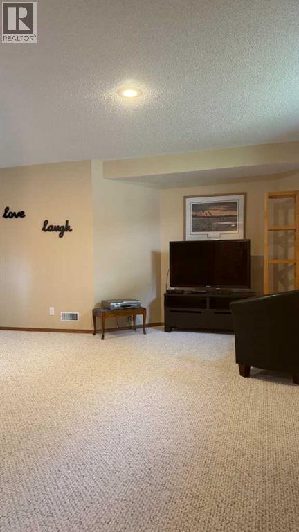 Photo 10 of 12 Bow Way, Cochrane AB