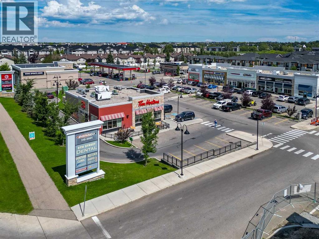 Photo 18 of 117 Channelside Cove Sw, Airdrie AB