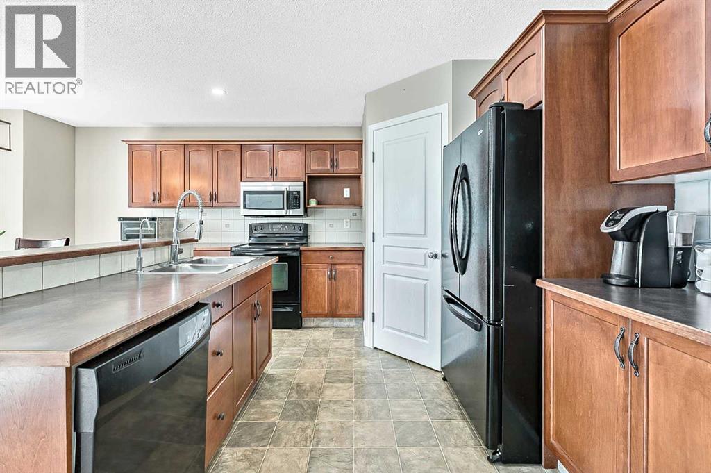Photo 14 of 117 Channelside Cove Sw, Airdrie AB