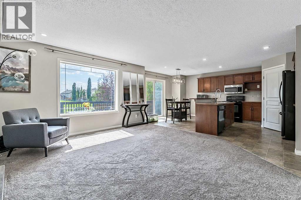 Photo 5 of 117 Channelside Cove Sw, Airdrie AB