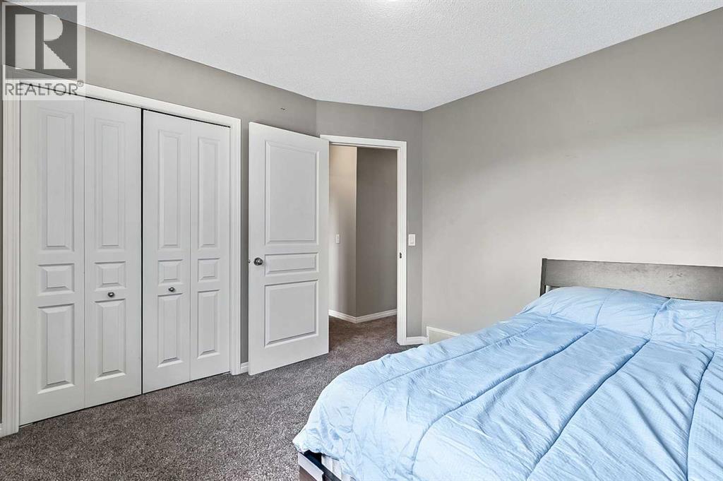 Photo 9 of 117 Channelside Cove Sw, Airdrie AB