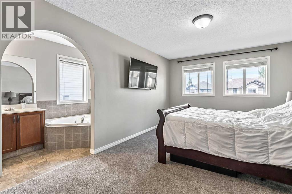 Photo 42 of 117 Channelside Cove Sw, Airdrie AB
