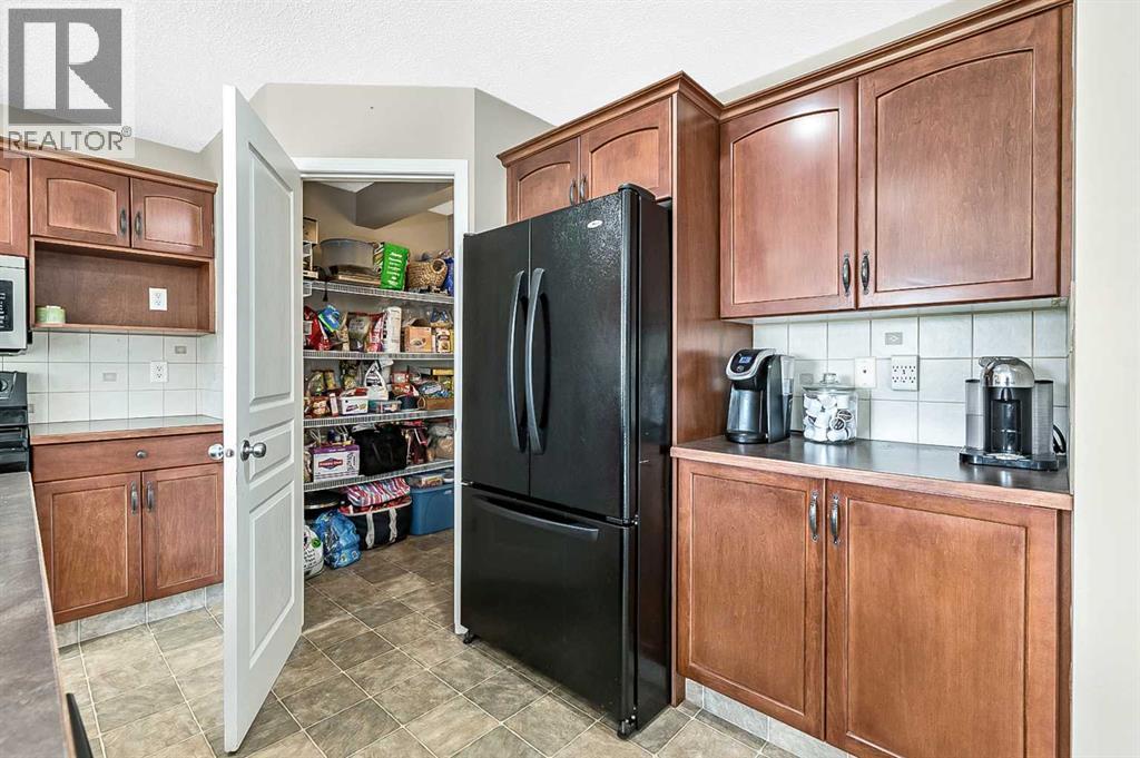 Photo 15 of 117 Channelside Cove Sw, Airdrie AB