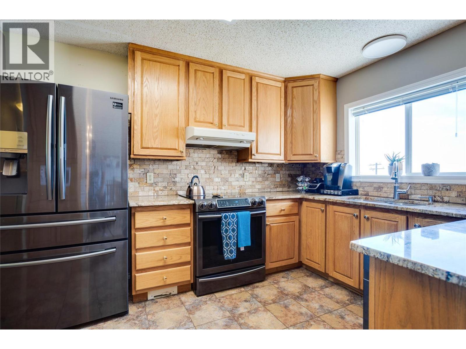 Photo 3 of 1175 Toovey Road, Kelowna BC