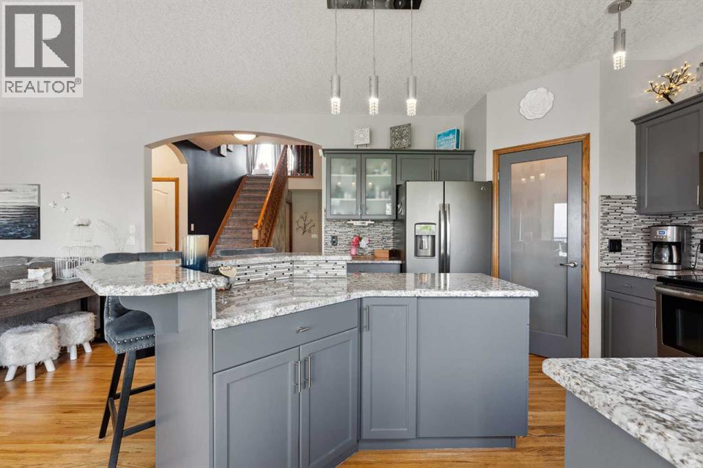 Photo 7 of 16 Bow Ridge Drive, Cochrane AB