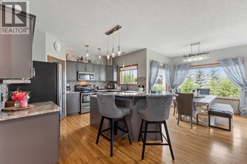 Photo 3 of 16 Bow Ridge Drive, Cochrane AB