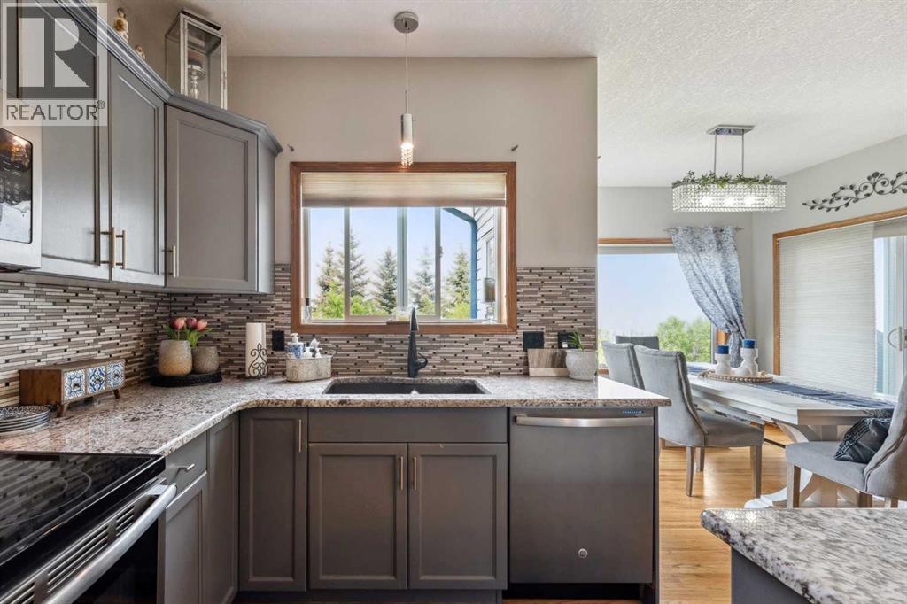 Photo 5 of 16 Bow Ridge Drive, Cochrane AB