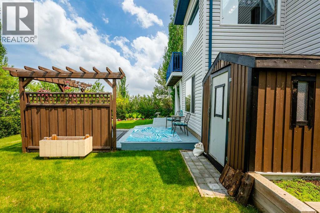Photo 44 of 16 Bow Ridge Drive, Cochrane AB