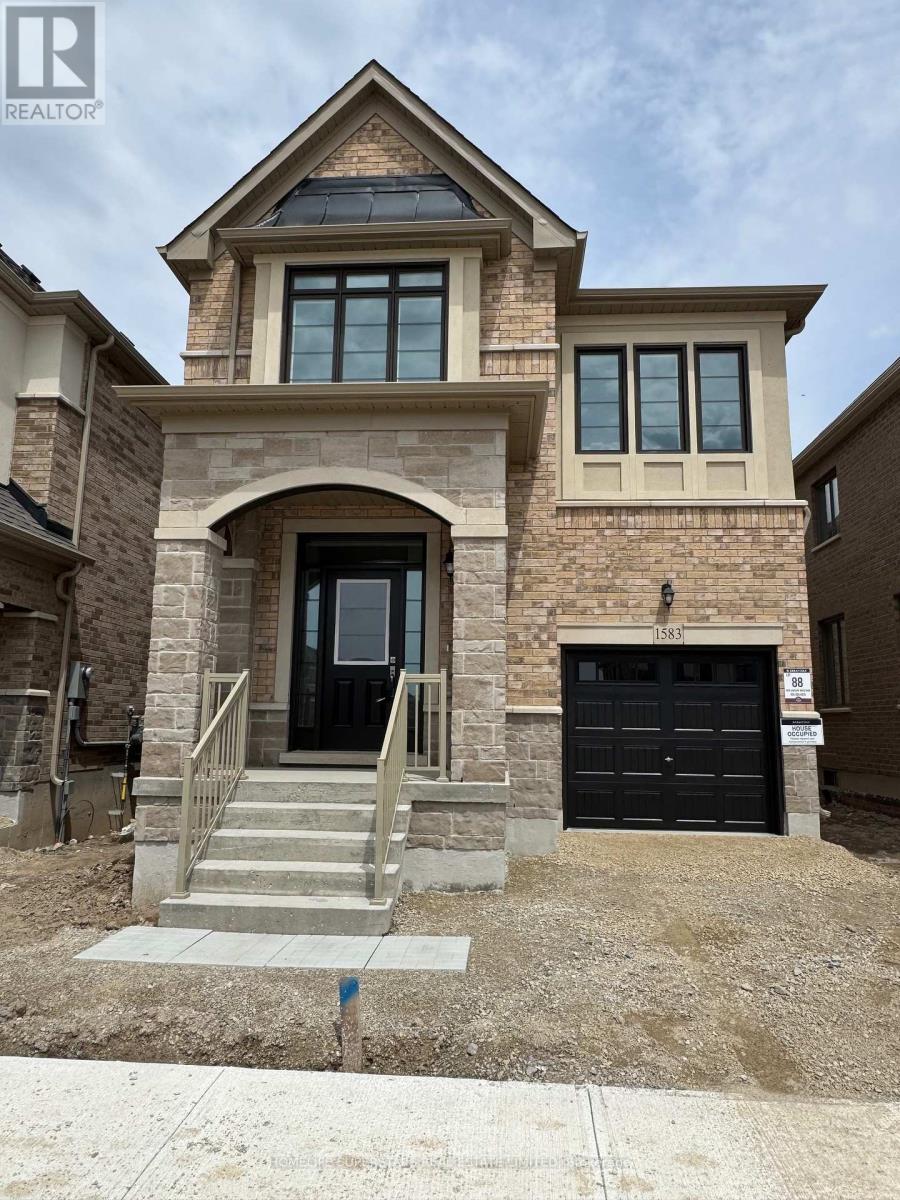 Photo 5 of 1583 Savoline Boulevard, Milton ON