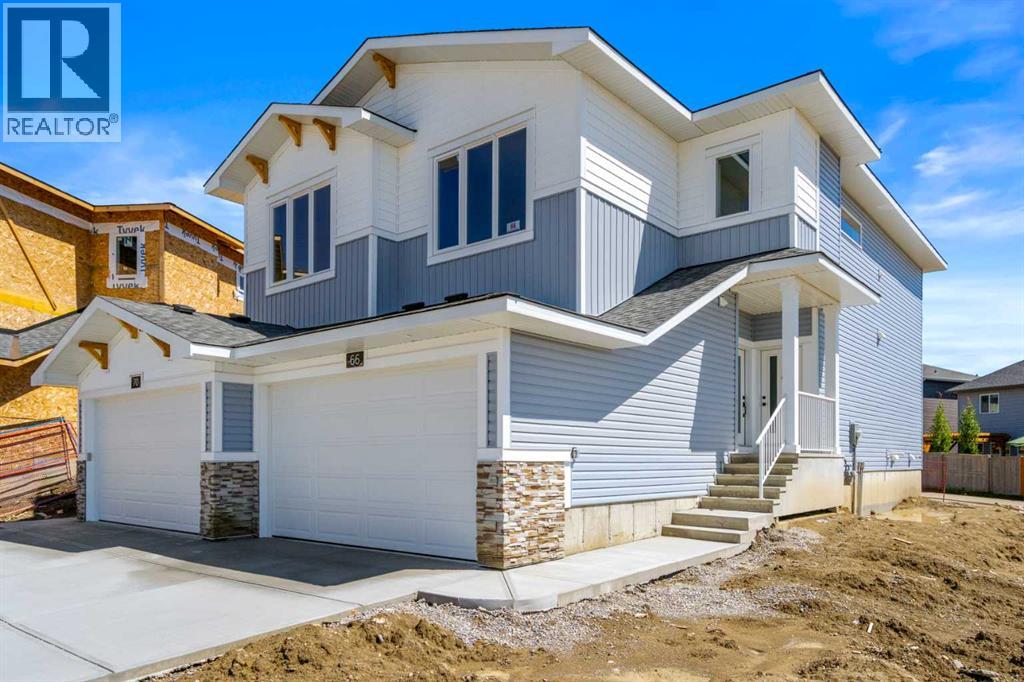Photo 39 of 66 Heritage Circle, Cochrane AB