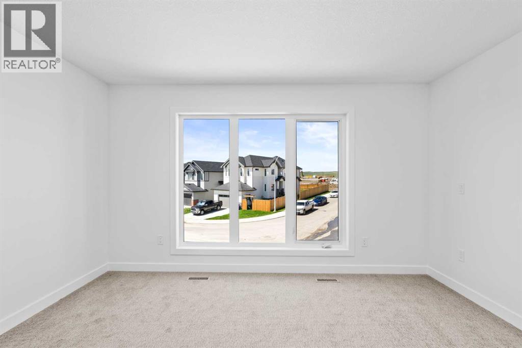 Photo 20 of 66 Heritage Circle, Cochrane AB